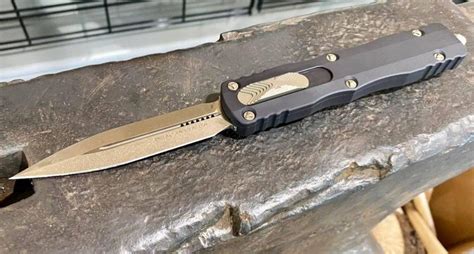 It&39;s a dual action out-the-front automatic with a thumb slide open and lock. . Microtech dirac delta bronze